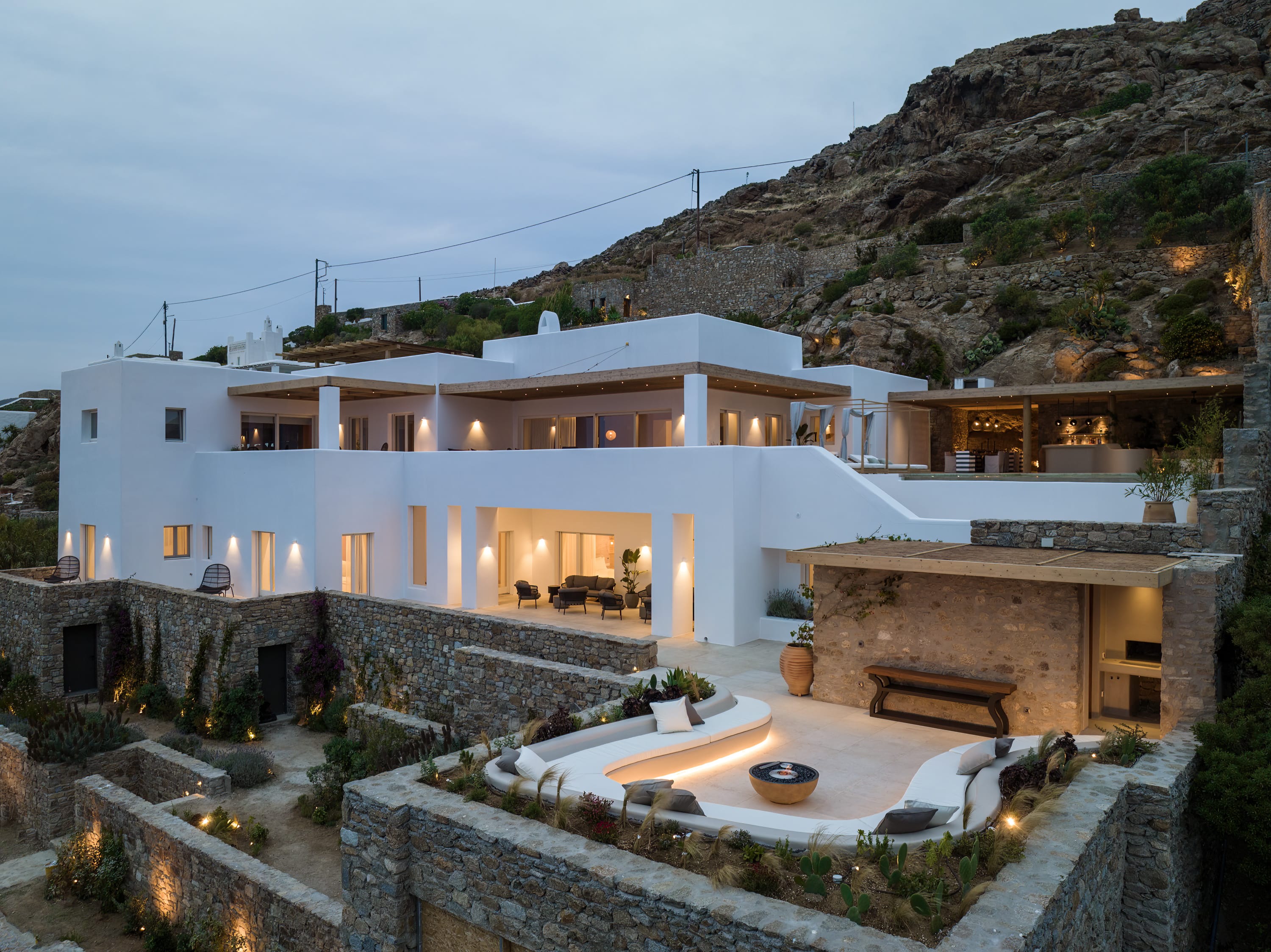 a building with a pool in front of it