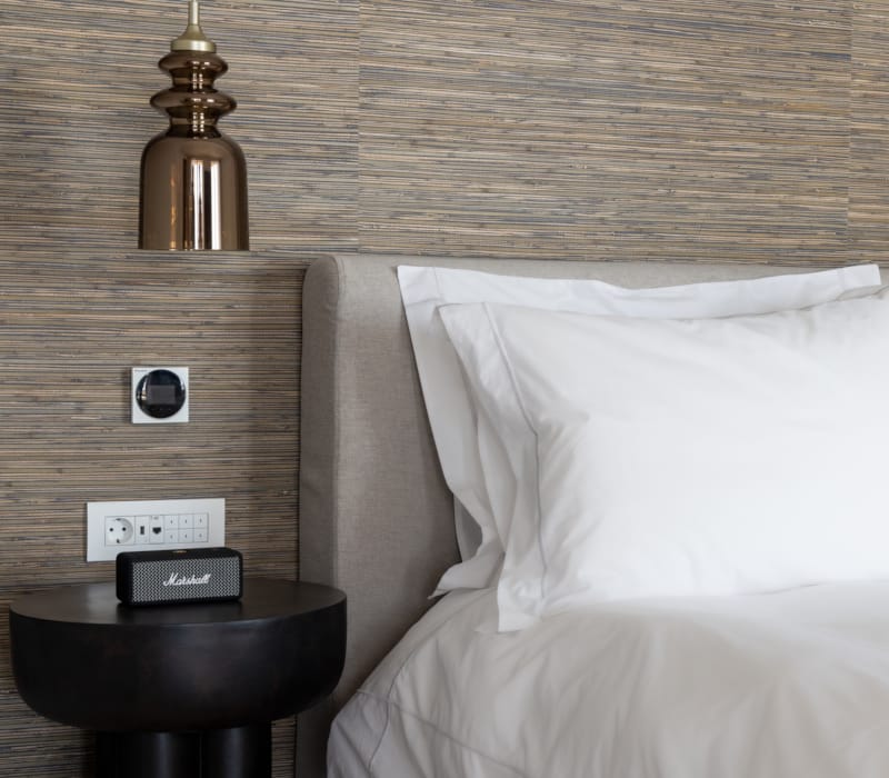 a bed with a white sheet