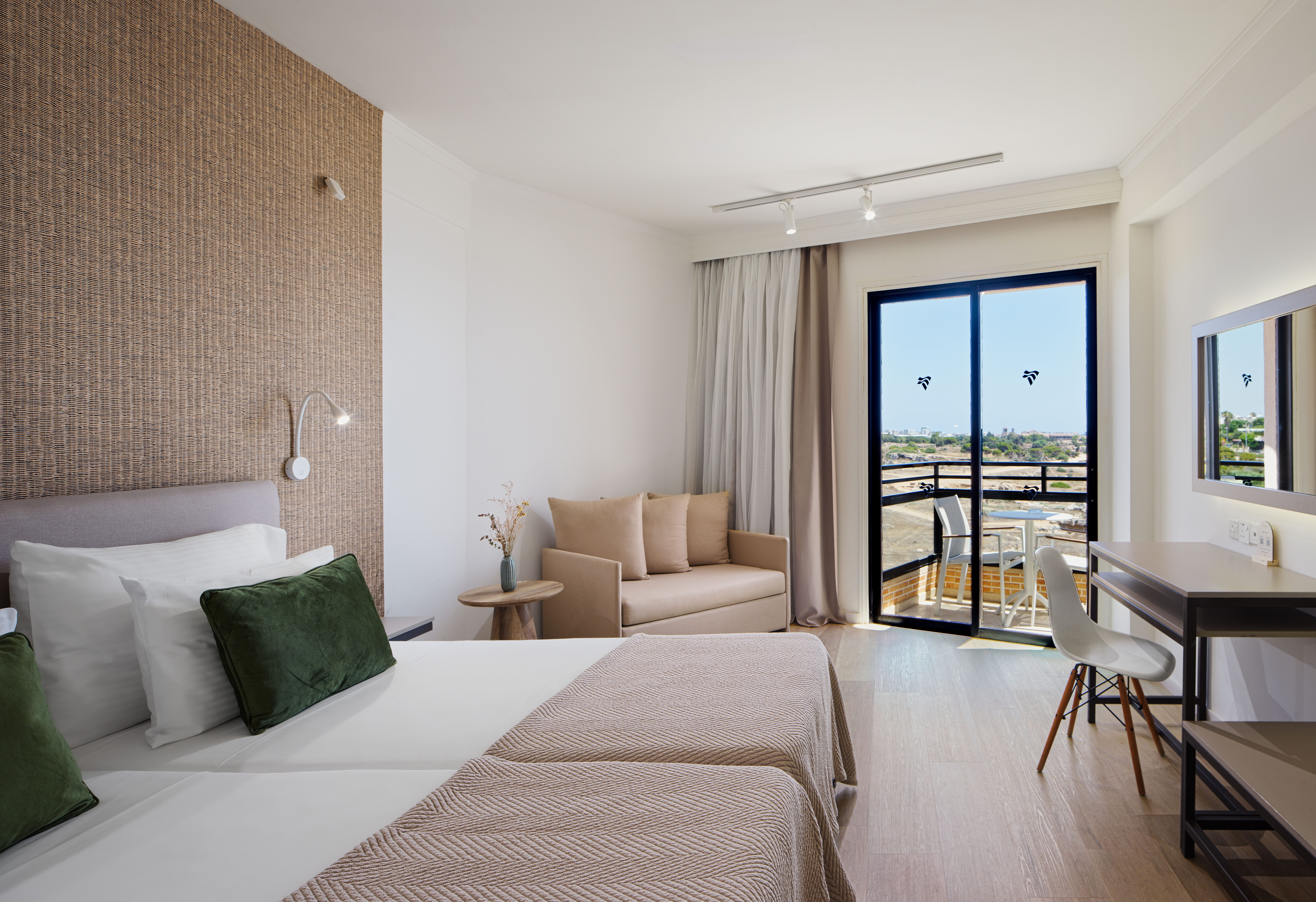 a room with a bed and a desk
