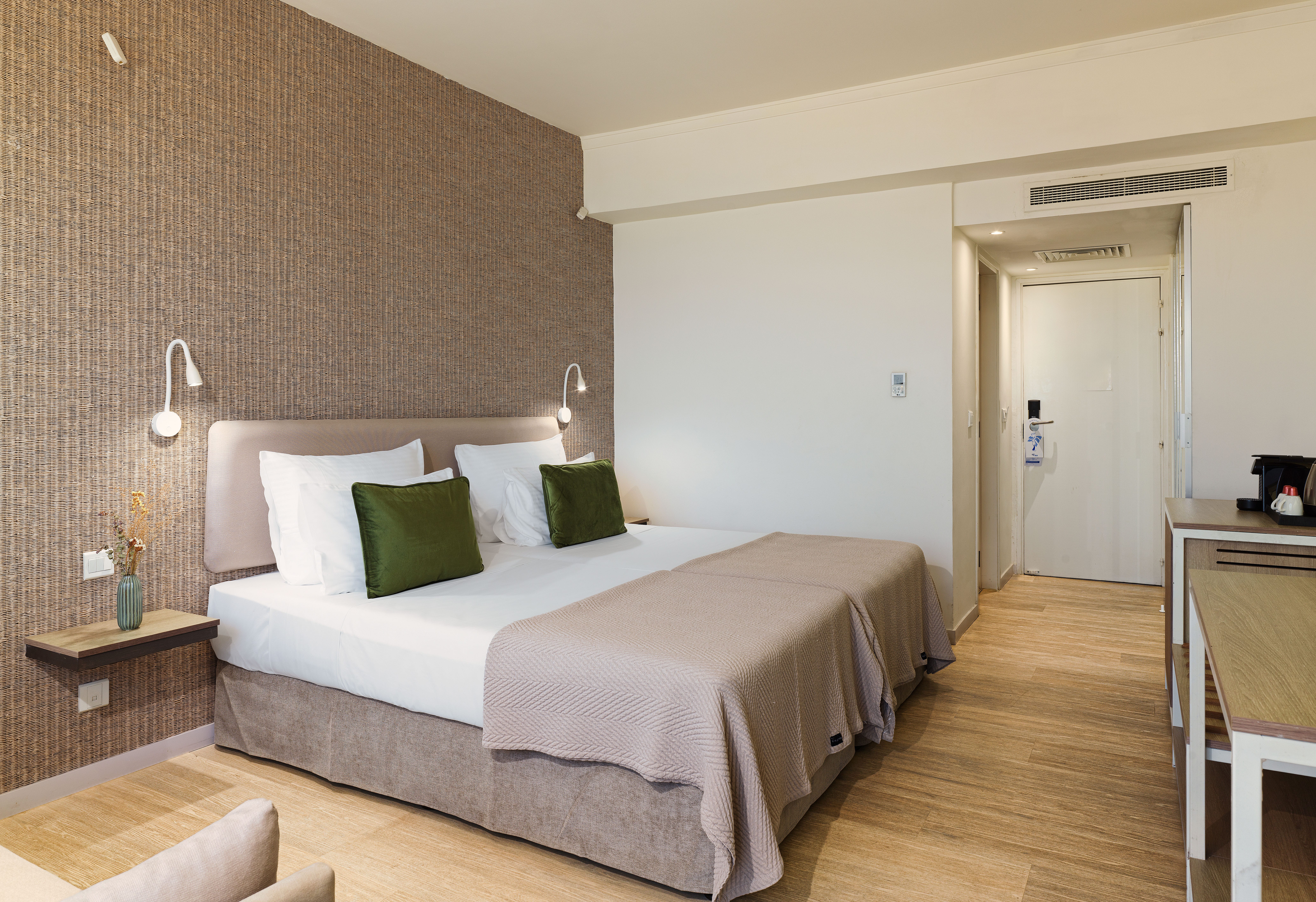 a room with a bed and a tv