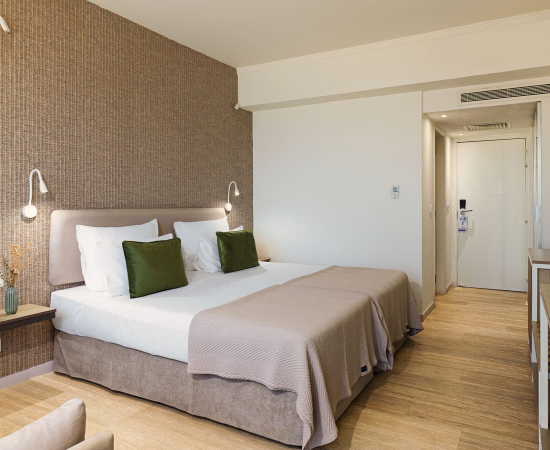 a room with a bed and a tv