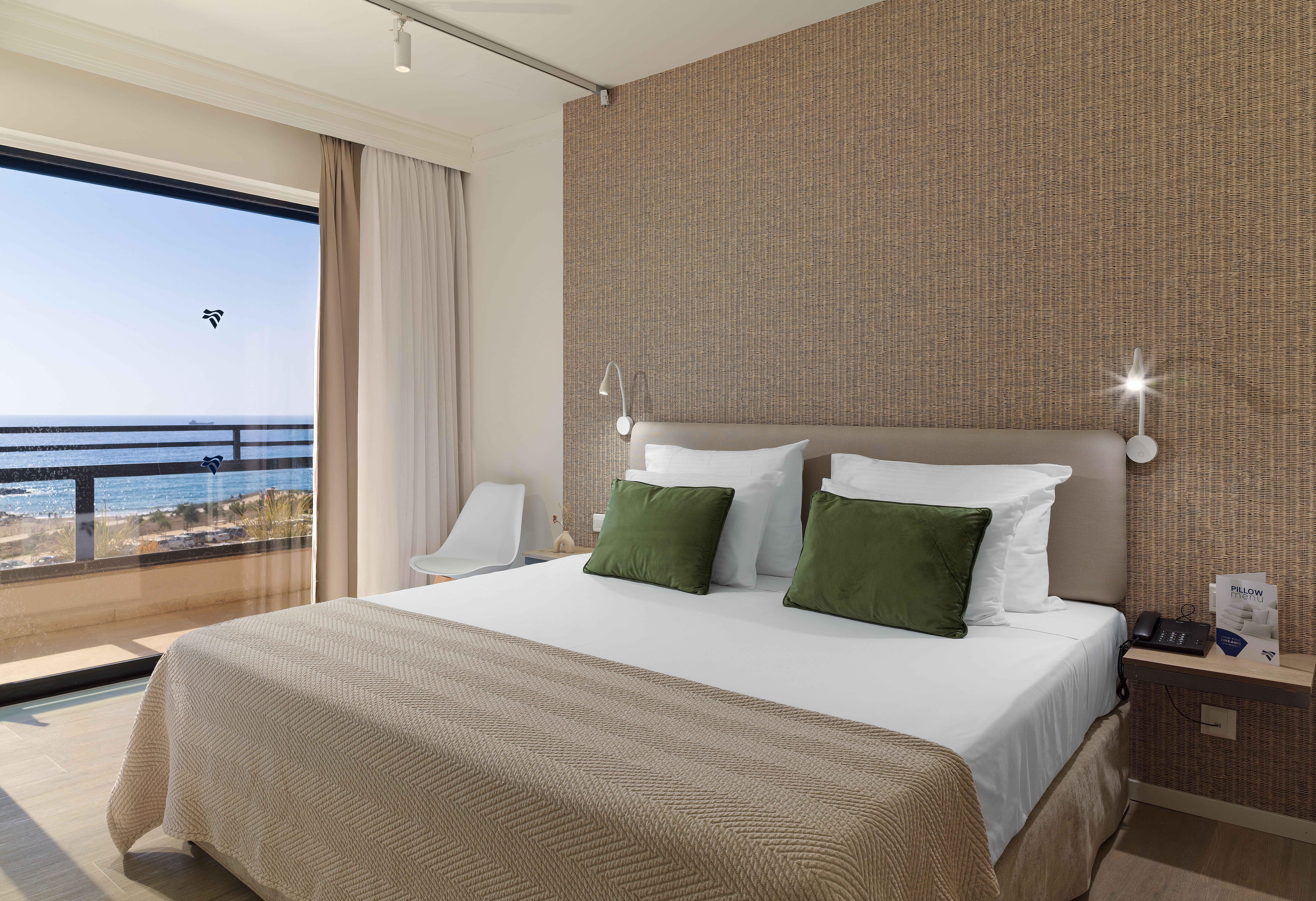 a bedroom with a bed and a tv