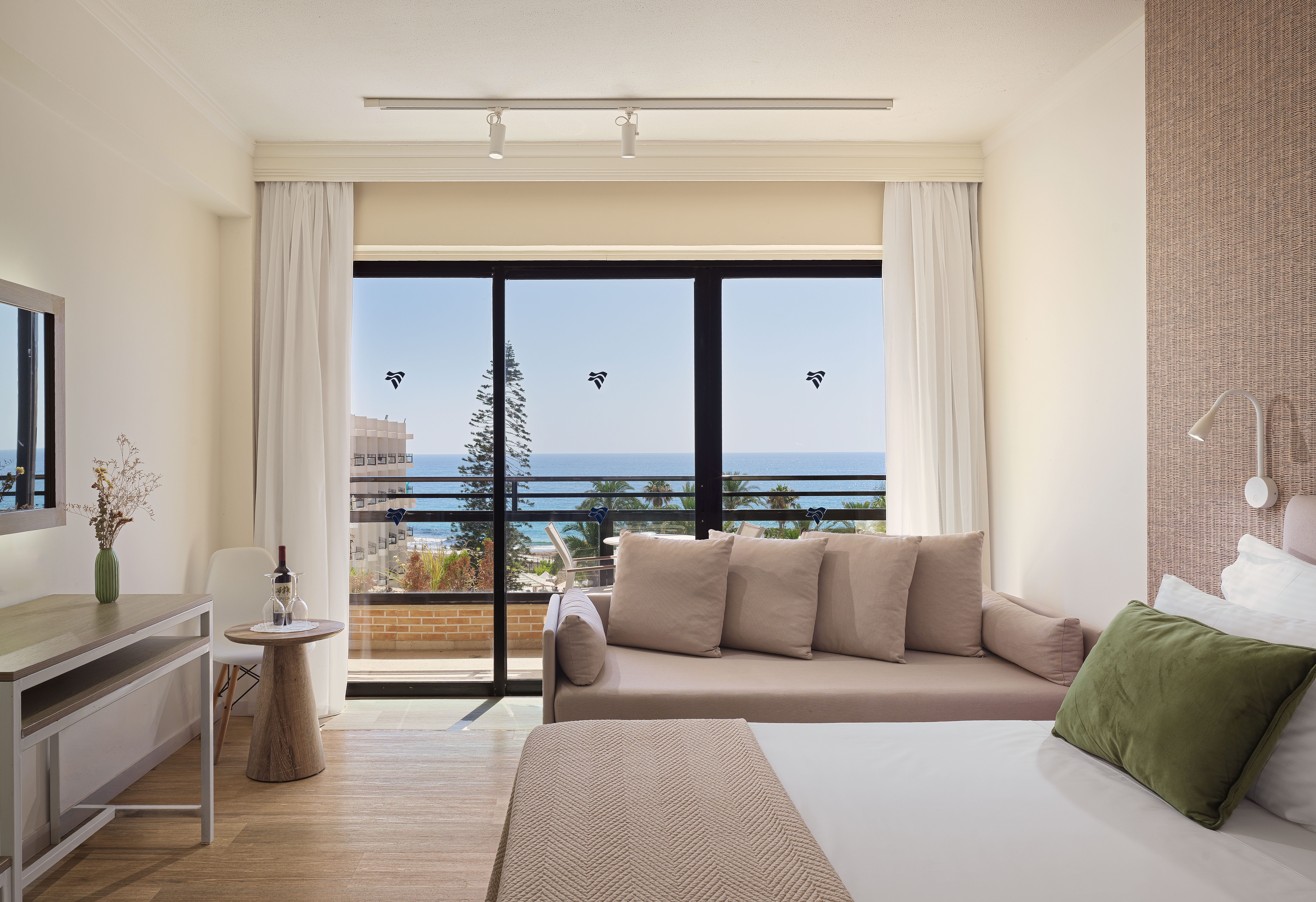 a room with a bed and couch