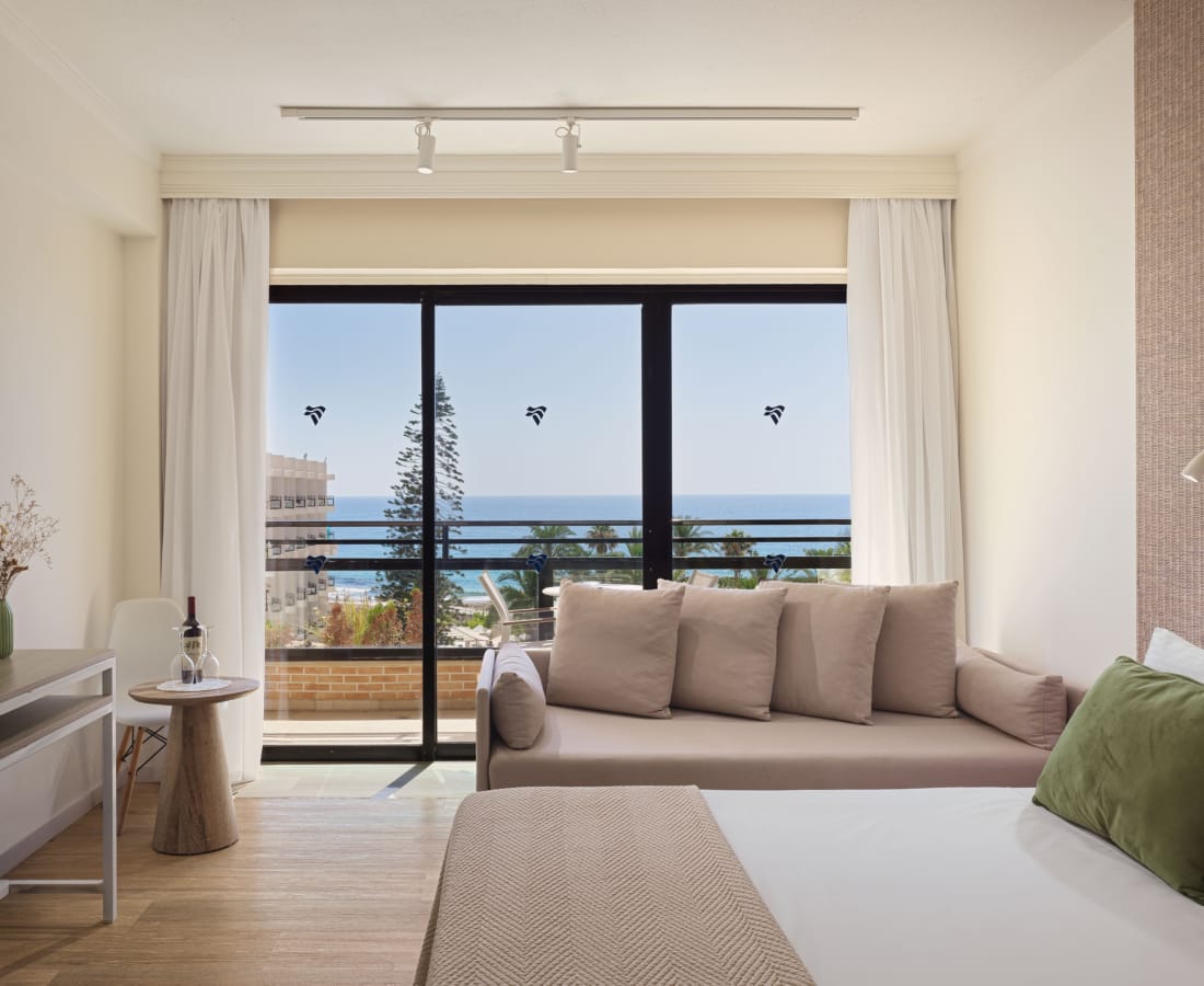 a room with a bed and couch