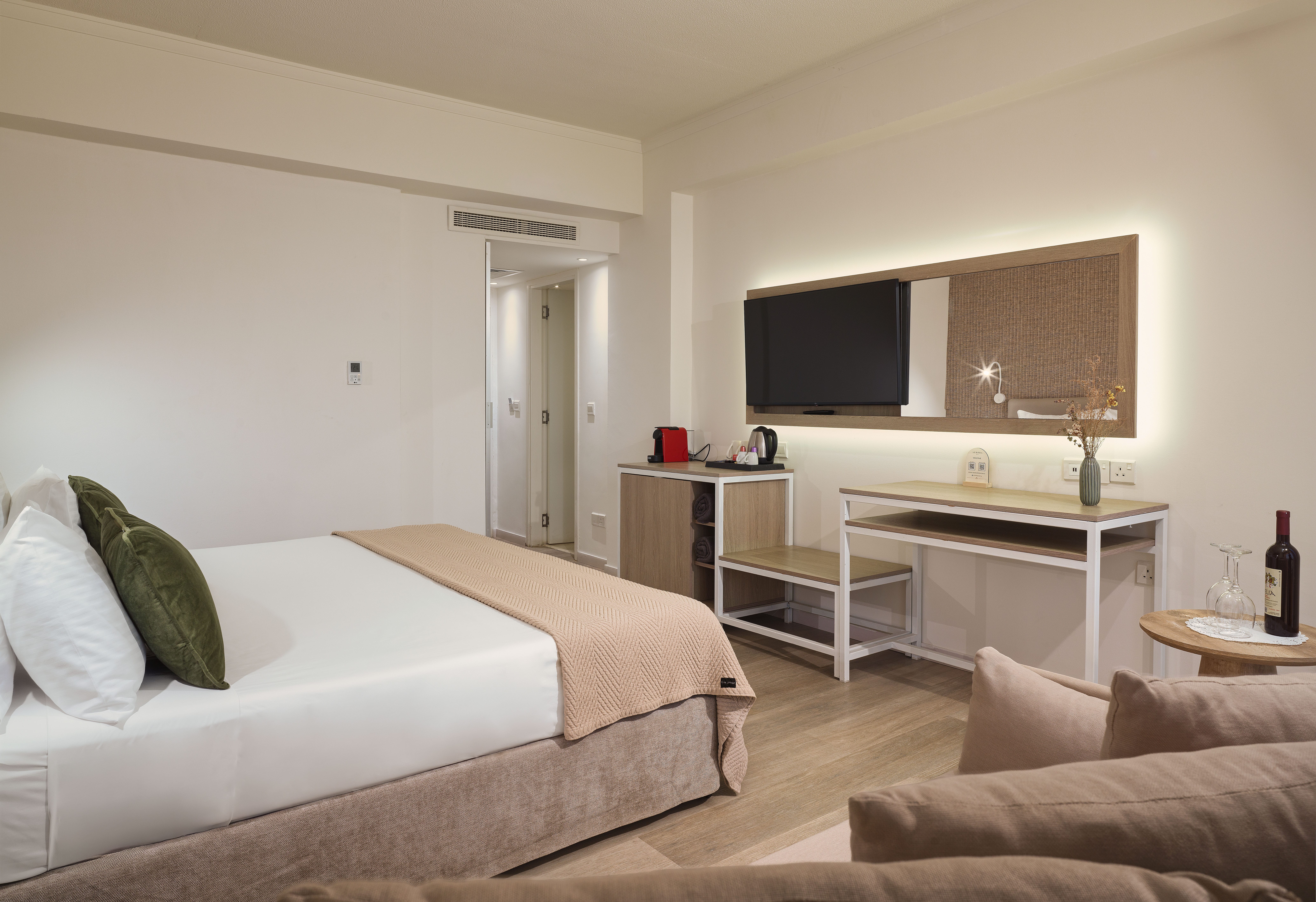 a room with a bed and couch