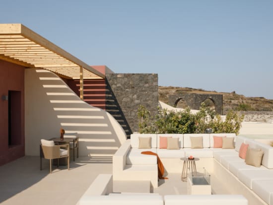 a house with a patio and a staircase