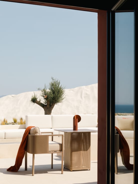 a room with a table and chairs