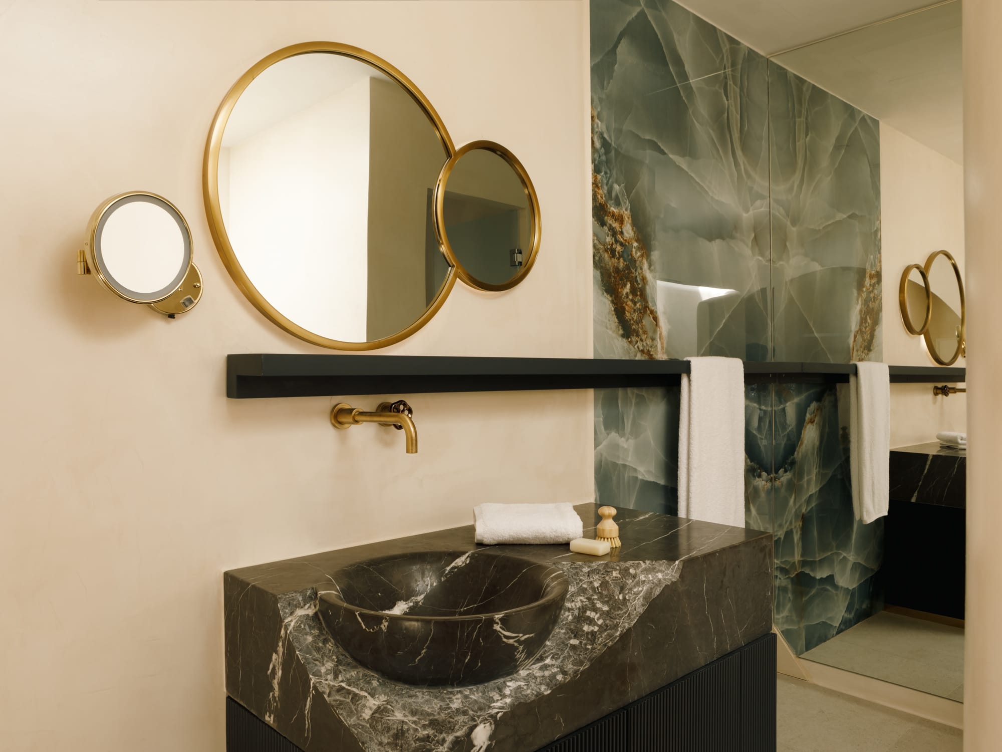 a bathroom with a large mirror