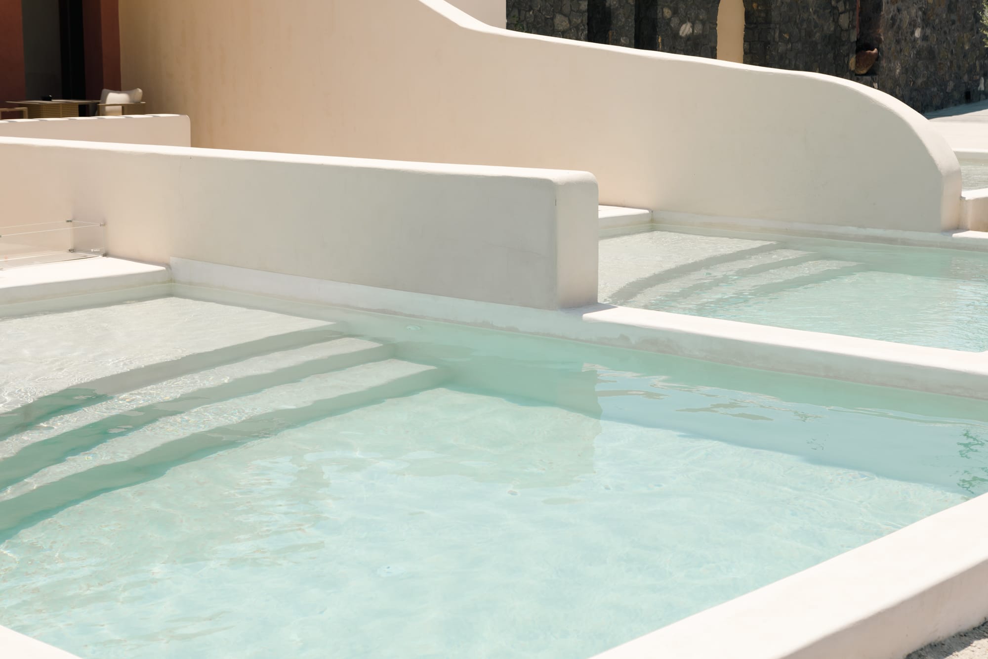 a pool with a white tile floor