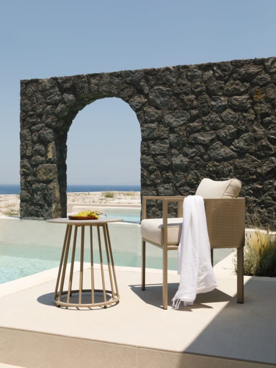 a chair and table on a deck