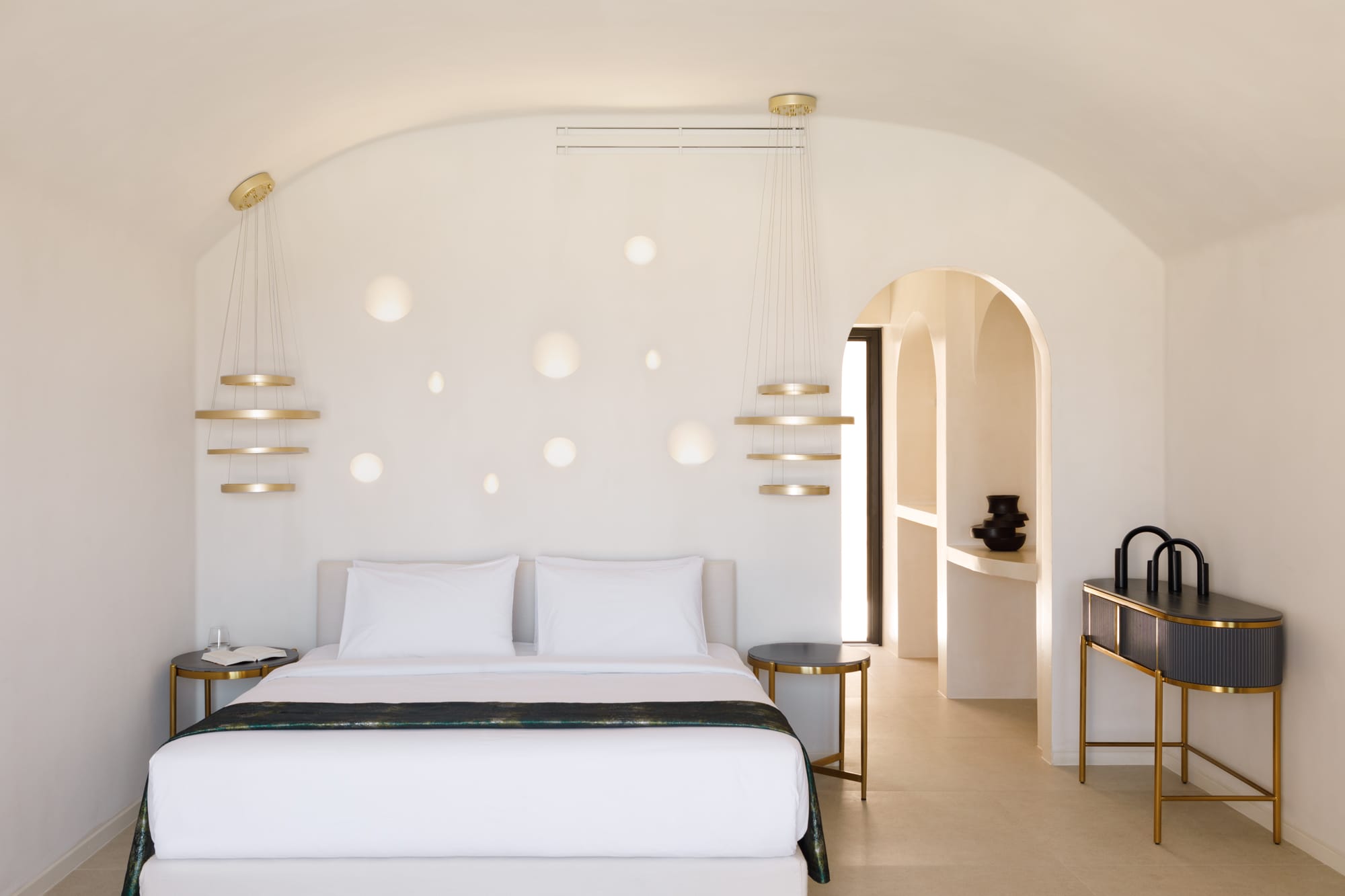 a room with a bed and a desk