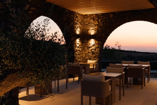 a room with tables and chairs