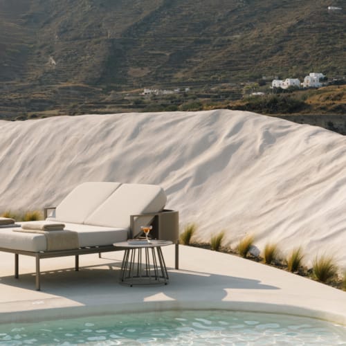 a pool with a building in the middle of it