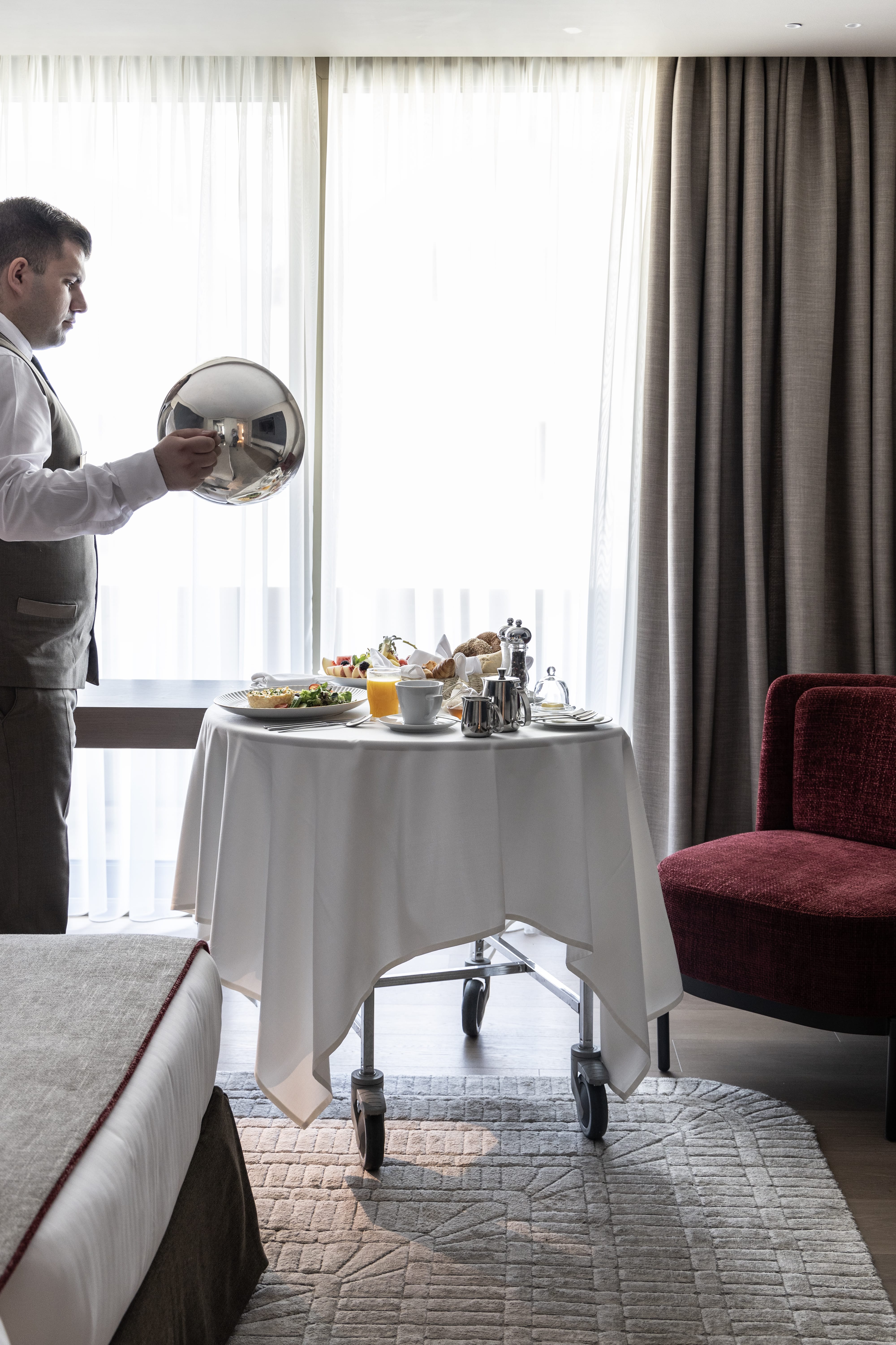 a person holding a plate of food