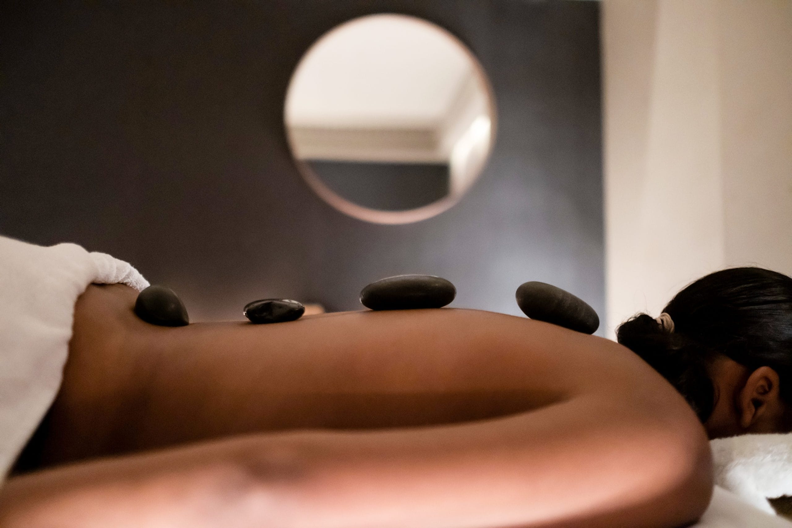 a person's arm with a black object on it