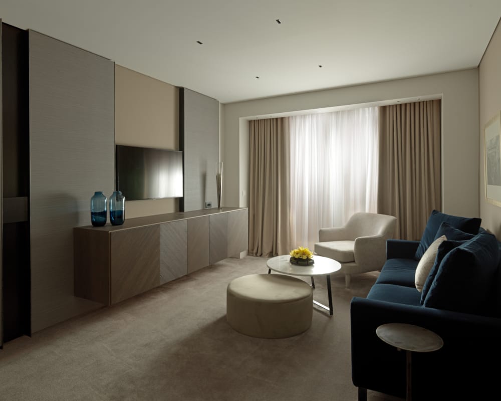 a living room with a couch and a table