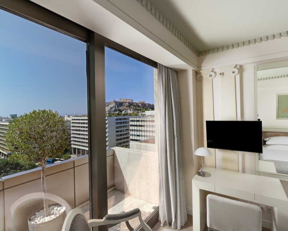 a room with a tv and a table