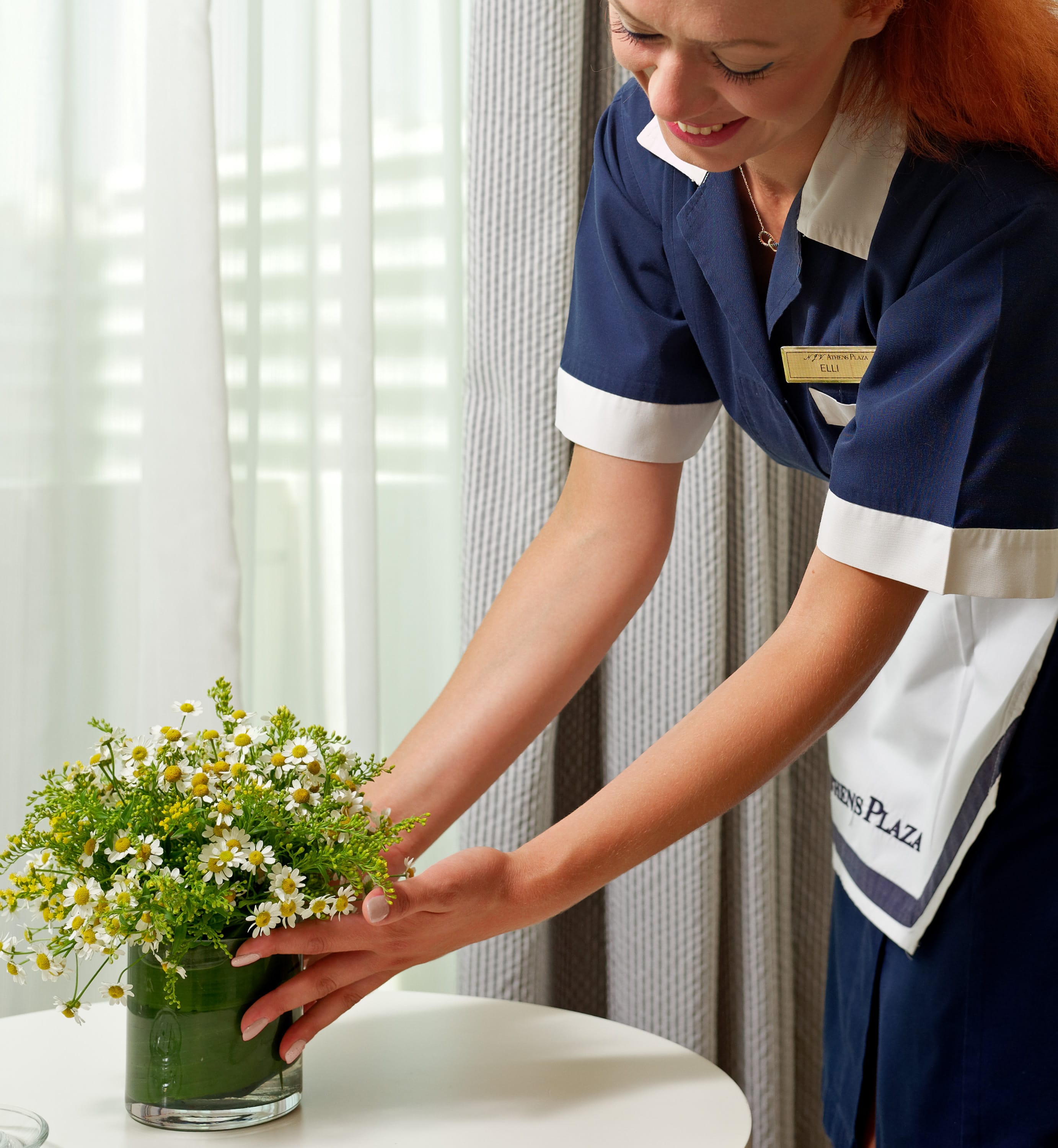 a woman in a blue coat