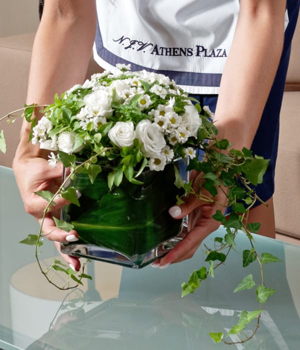 a person holding a bouquet of flowers