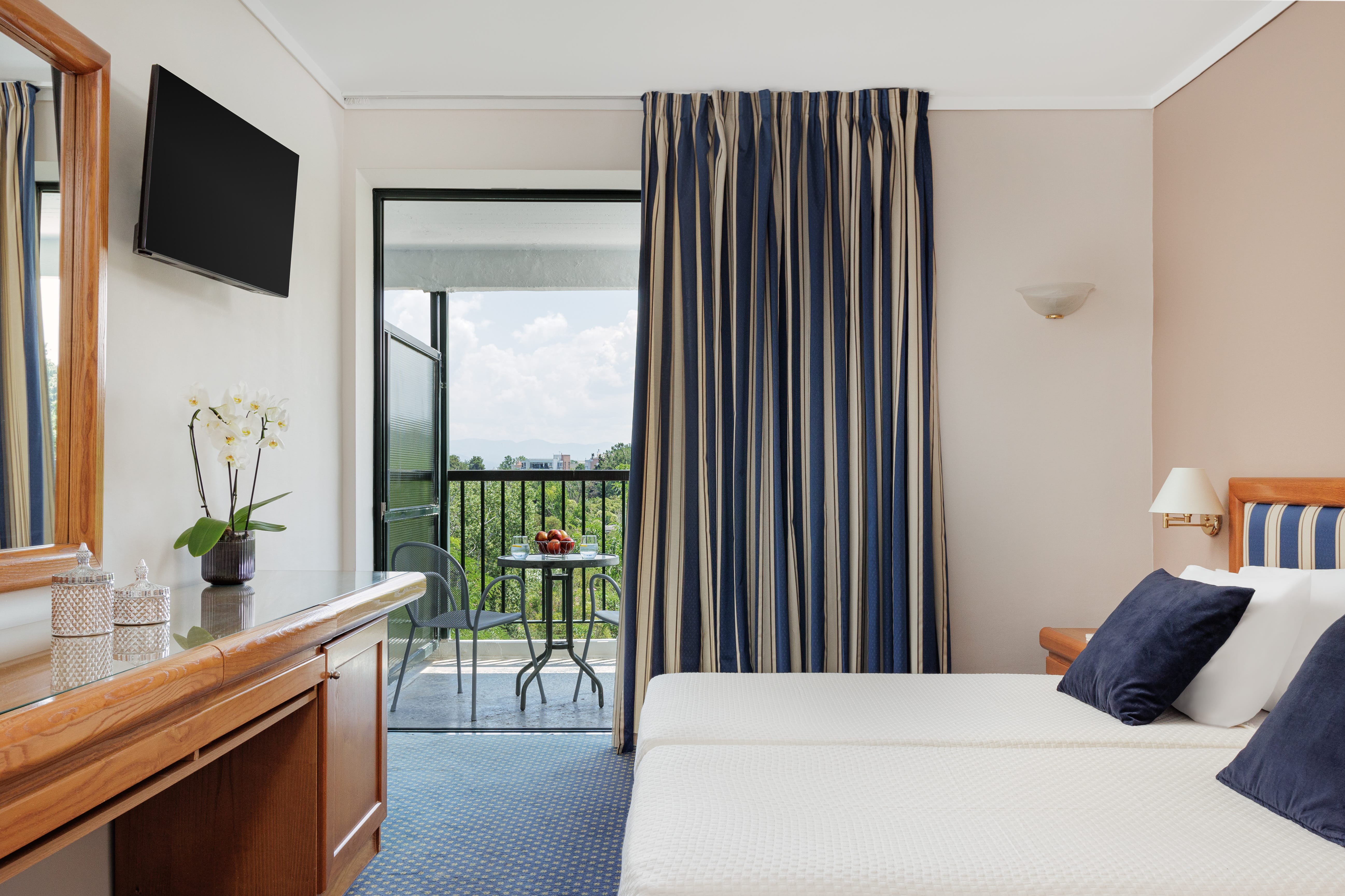 a bedroom with a large window