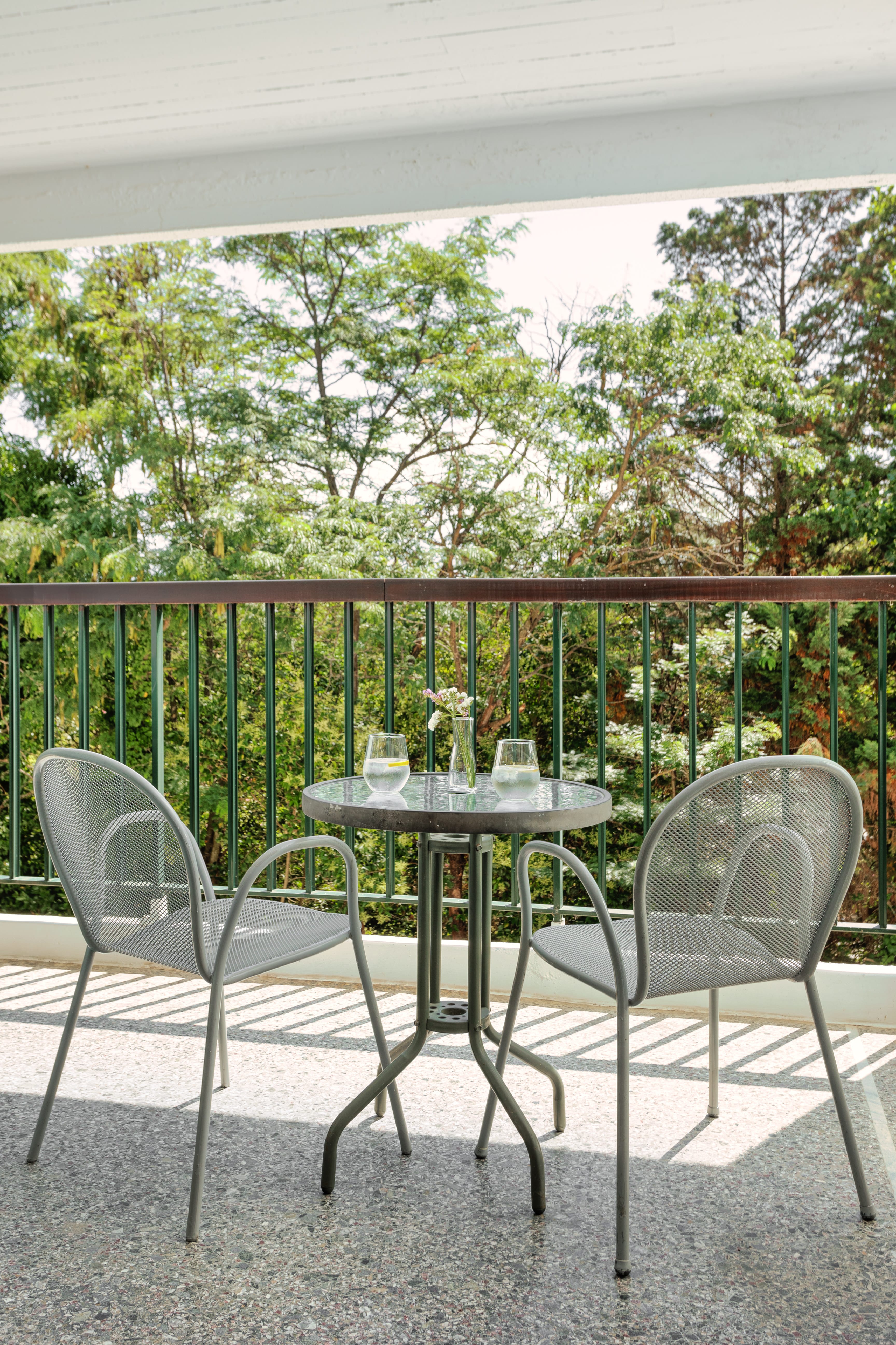 a table and chairs on a deck