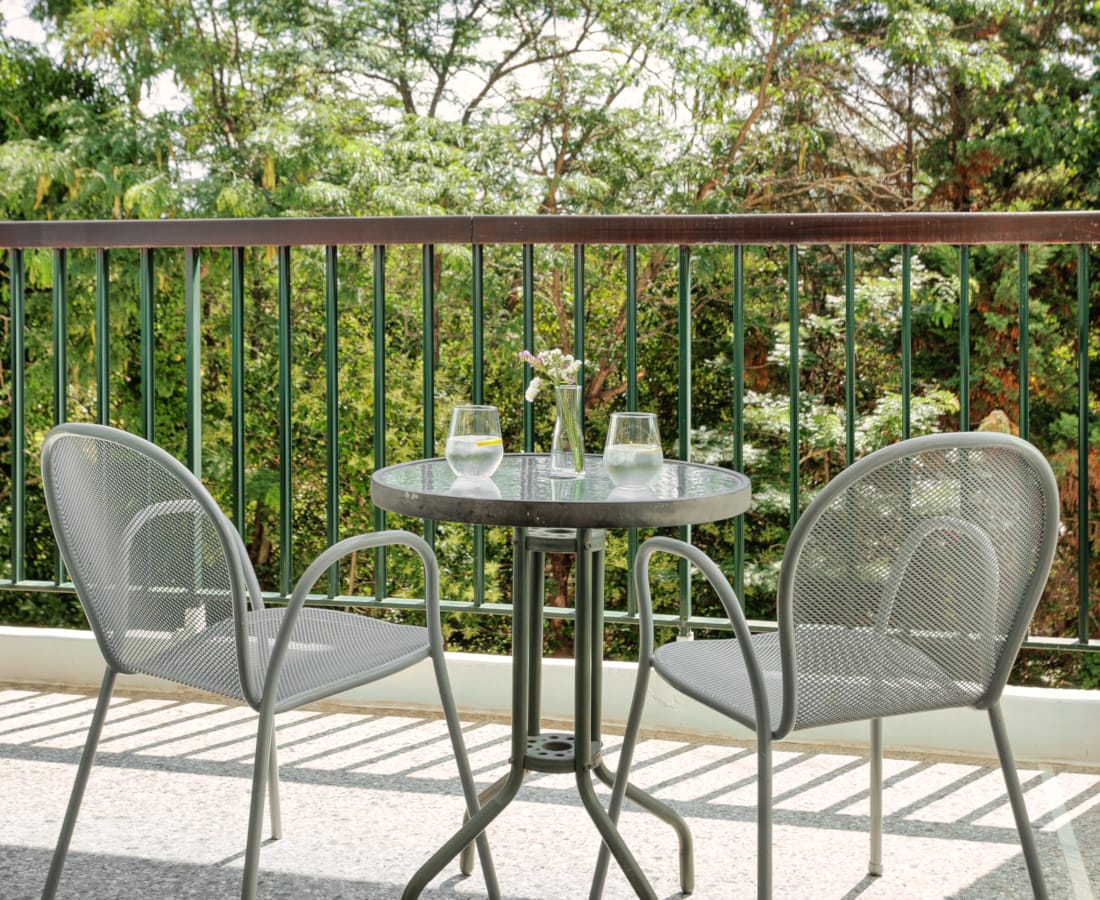 a table and chairs on a deck