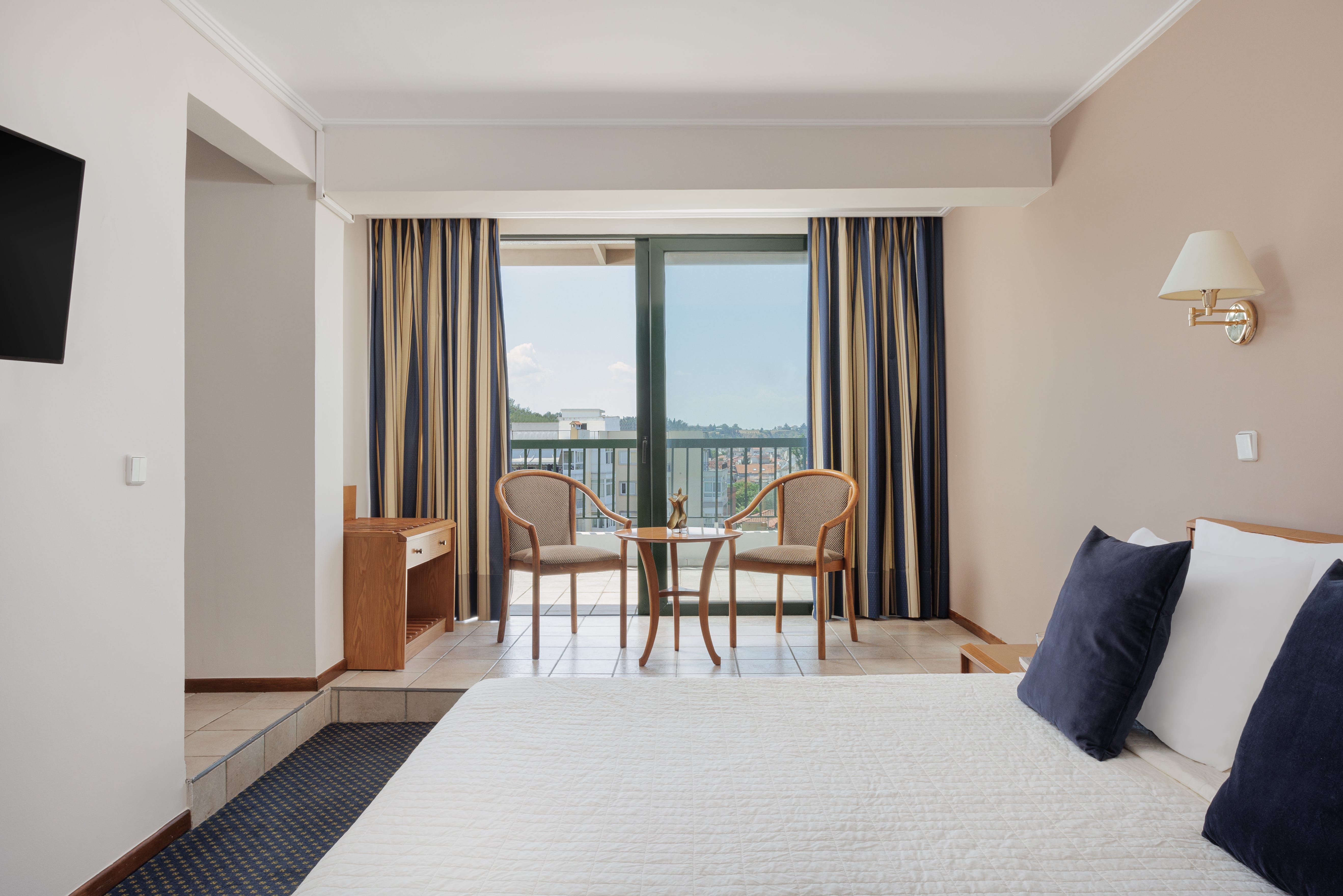 a room with a table and chairs