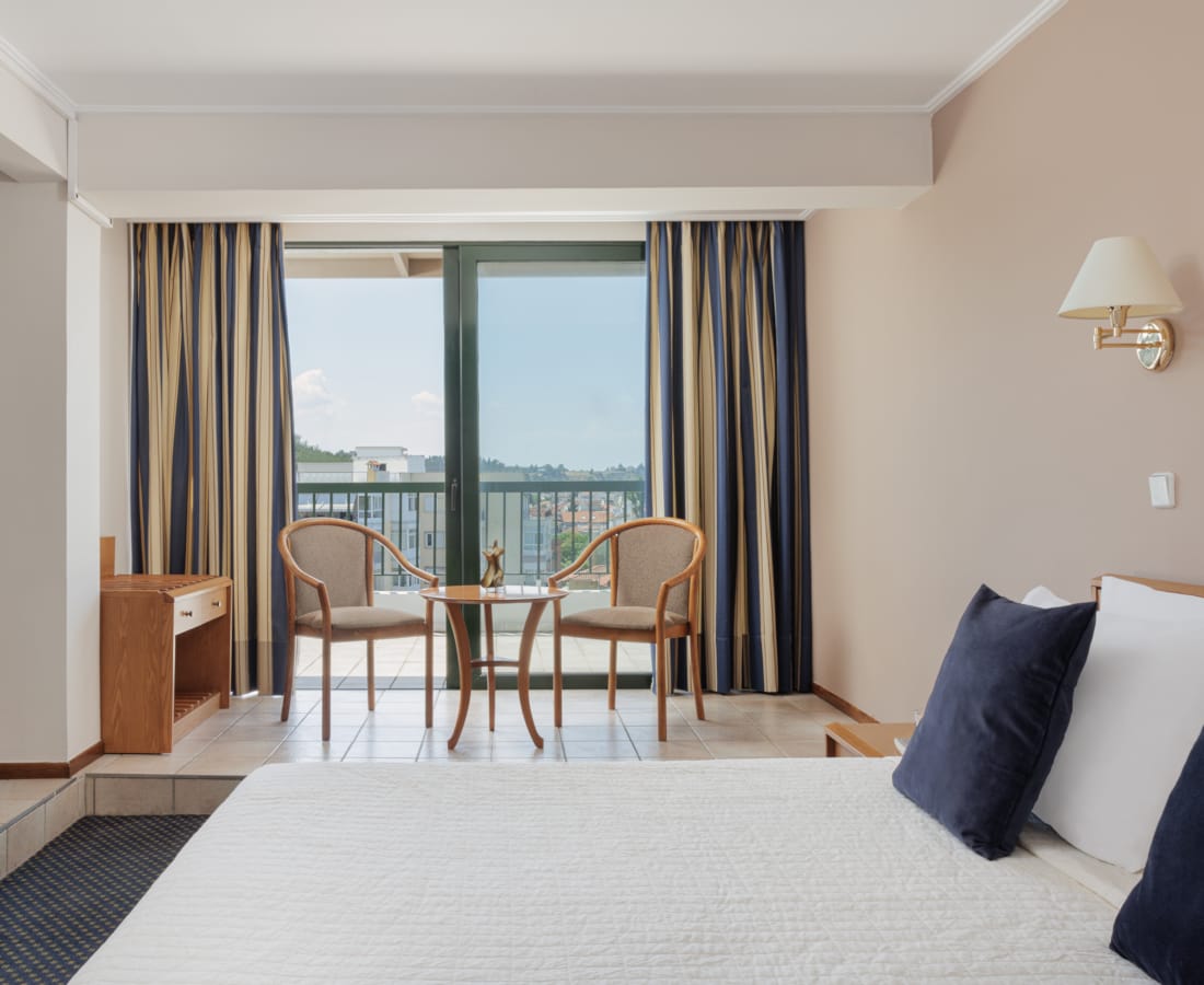 a room with a table and chairs