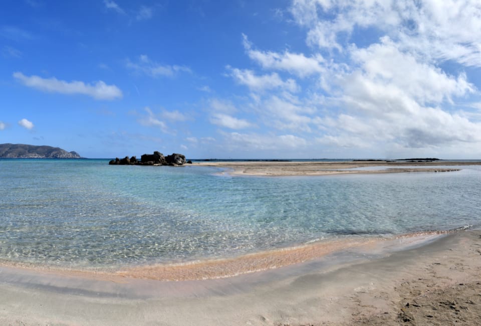 a beach with a body of water
