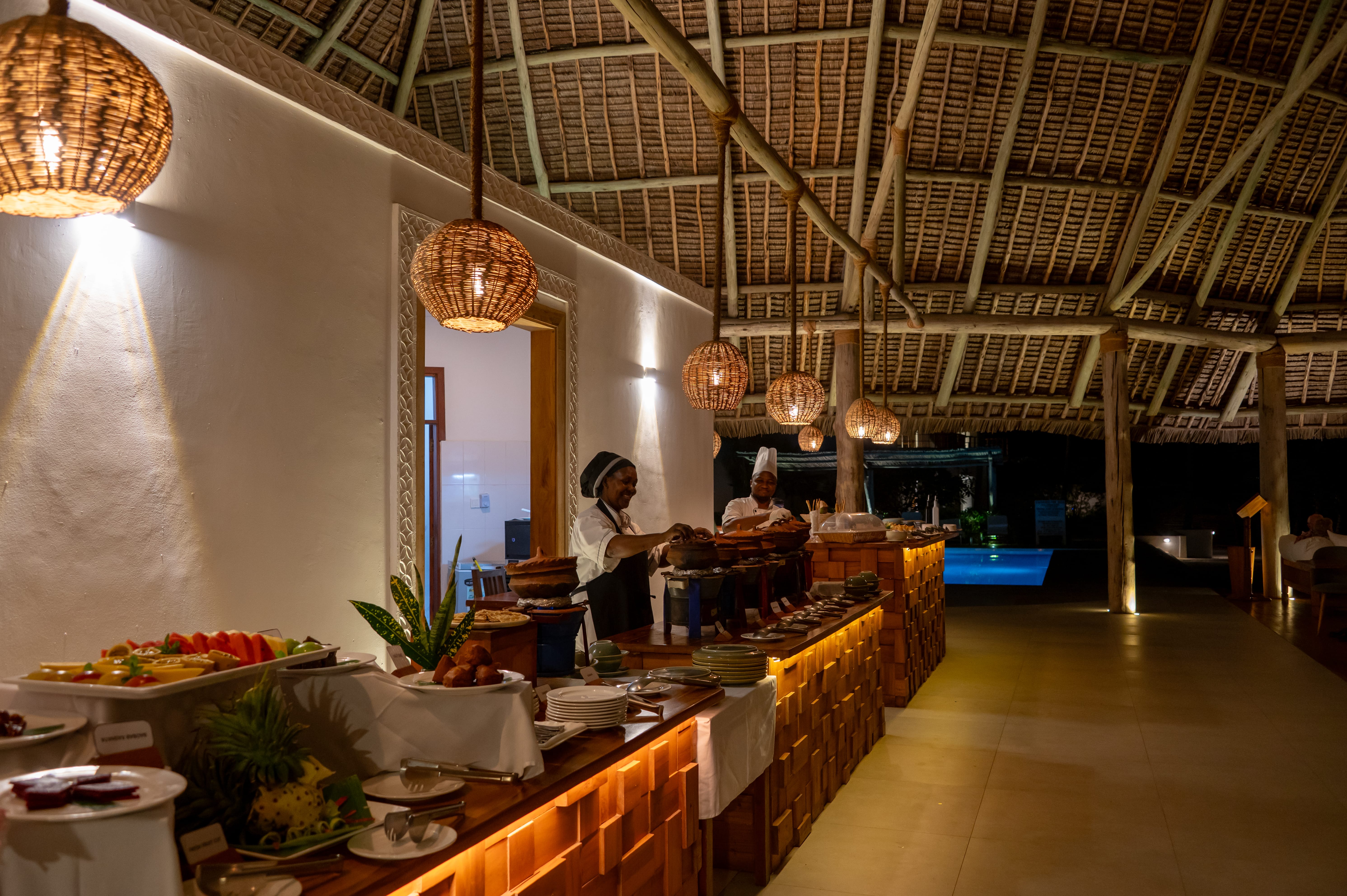 a restaurant with a few people