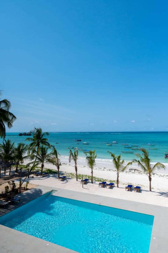 a pool next to a beach