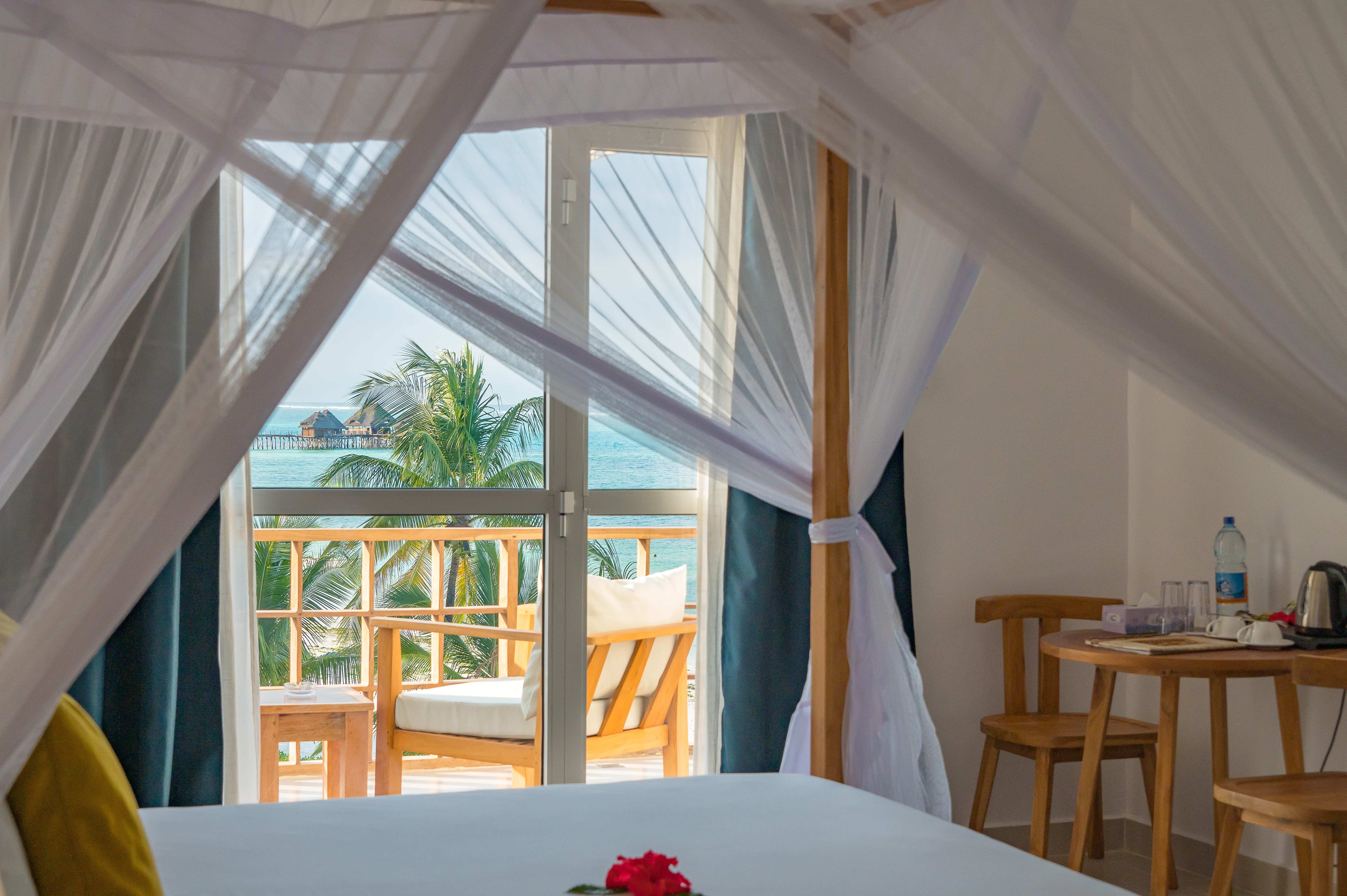 a room with a table and chairs