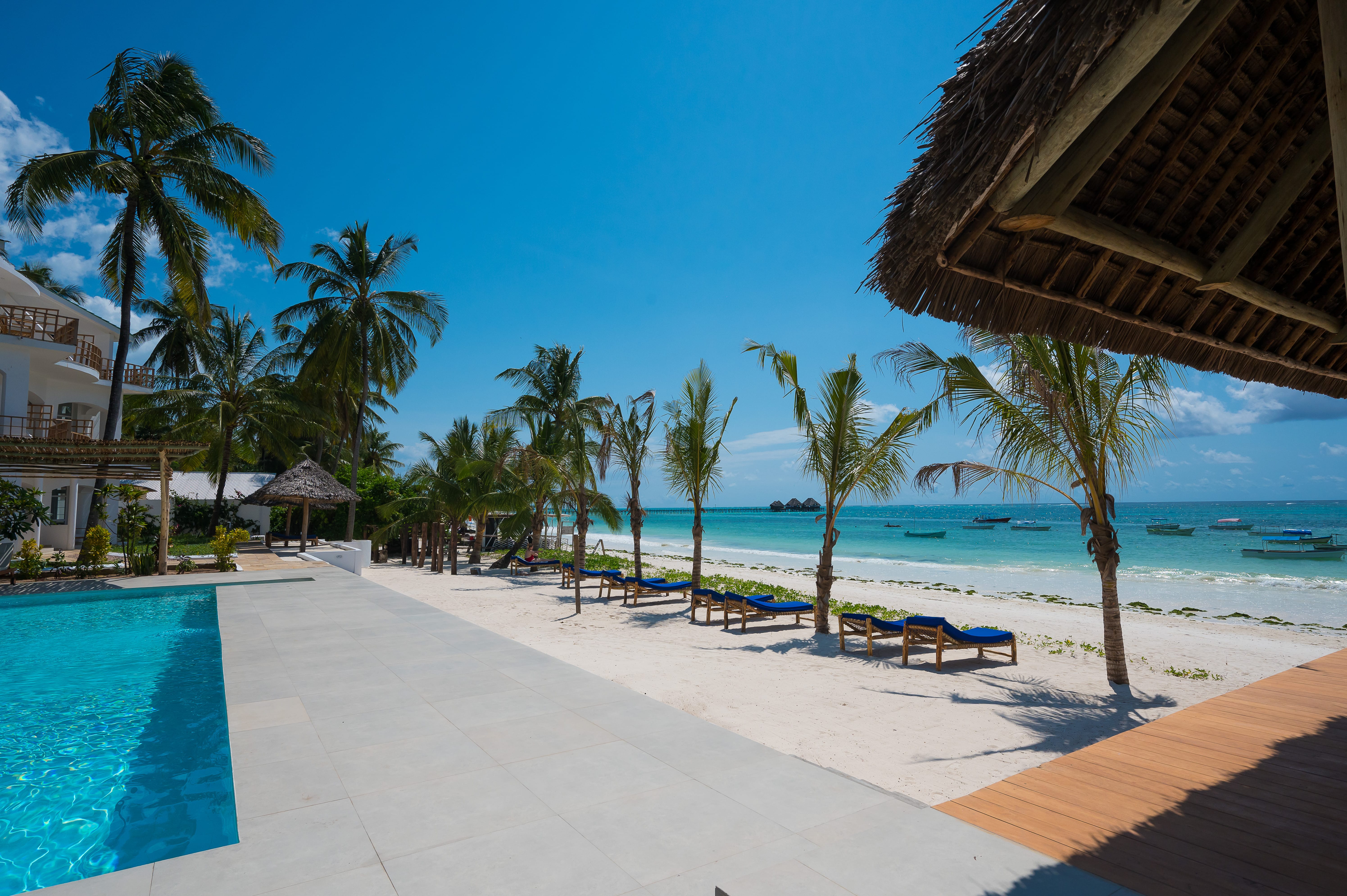 a pool next to a beach