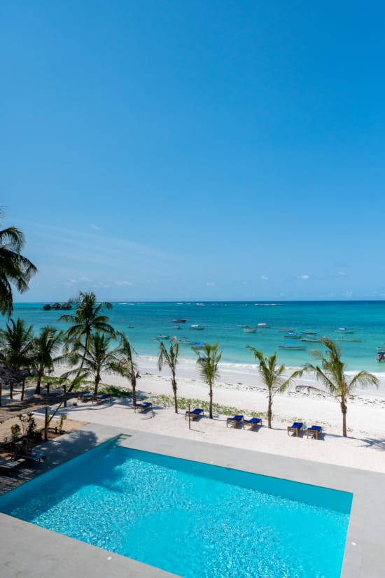 a pool next to a beach