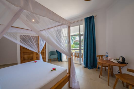 a room with a bed and a table