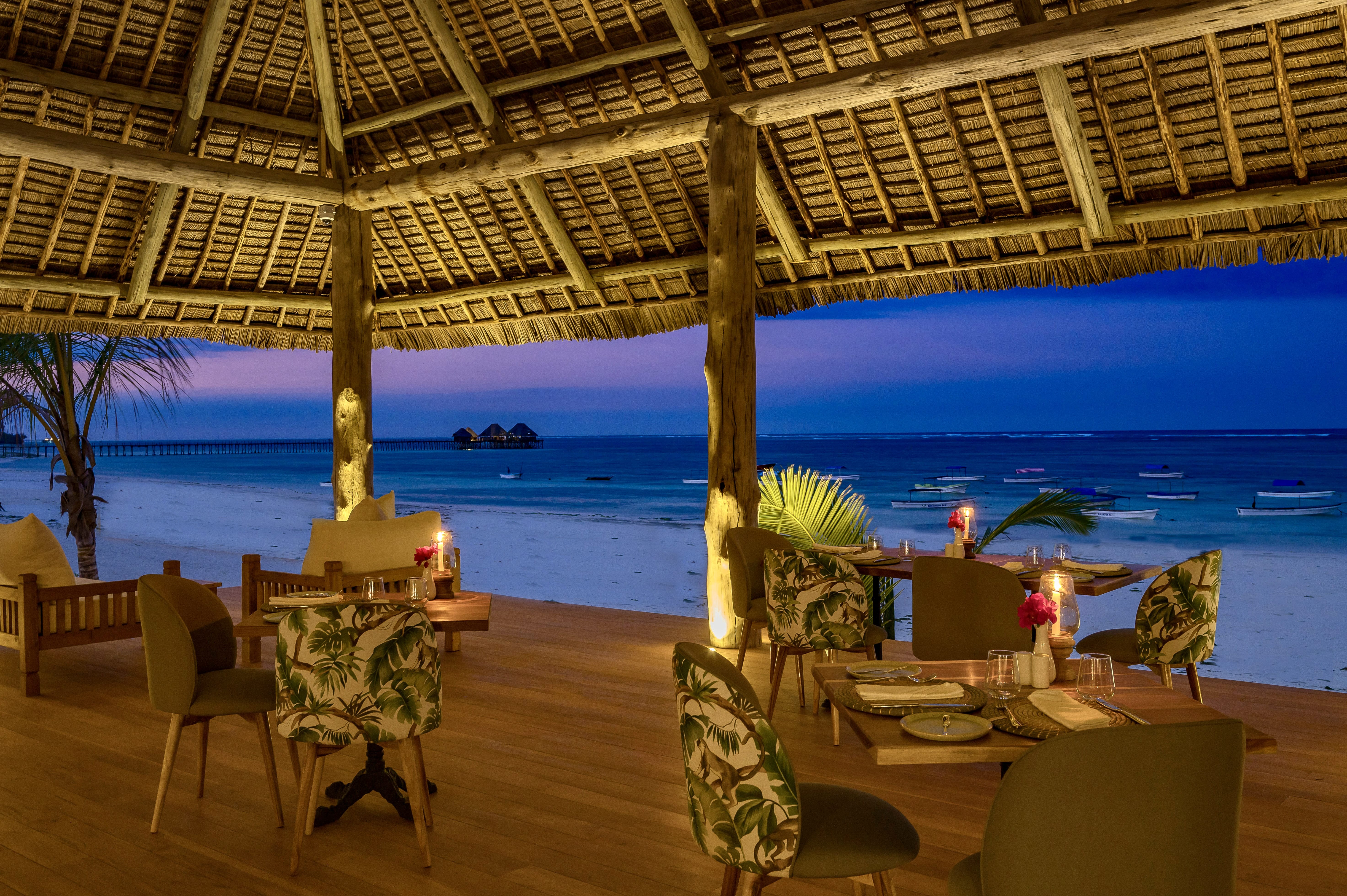 a restaurant with tables and chairs