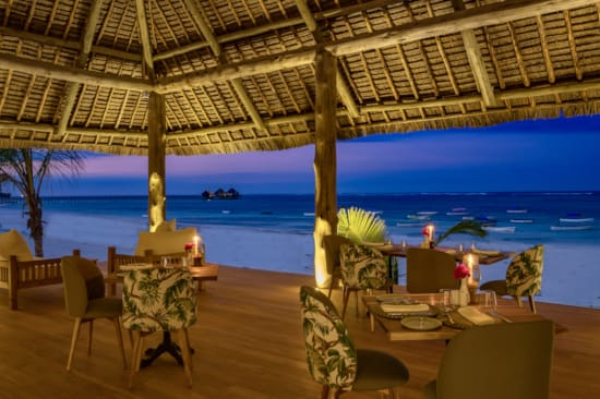 a restaurant with tables and chairs