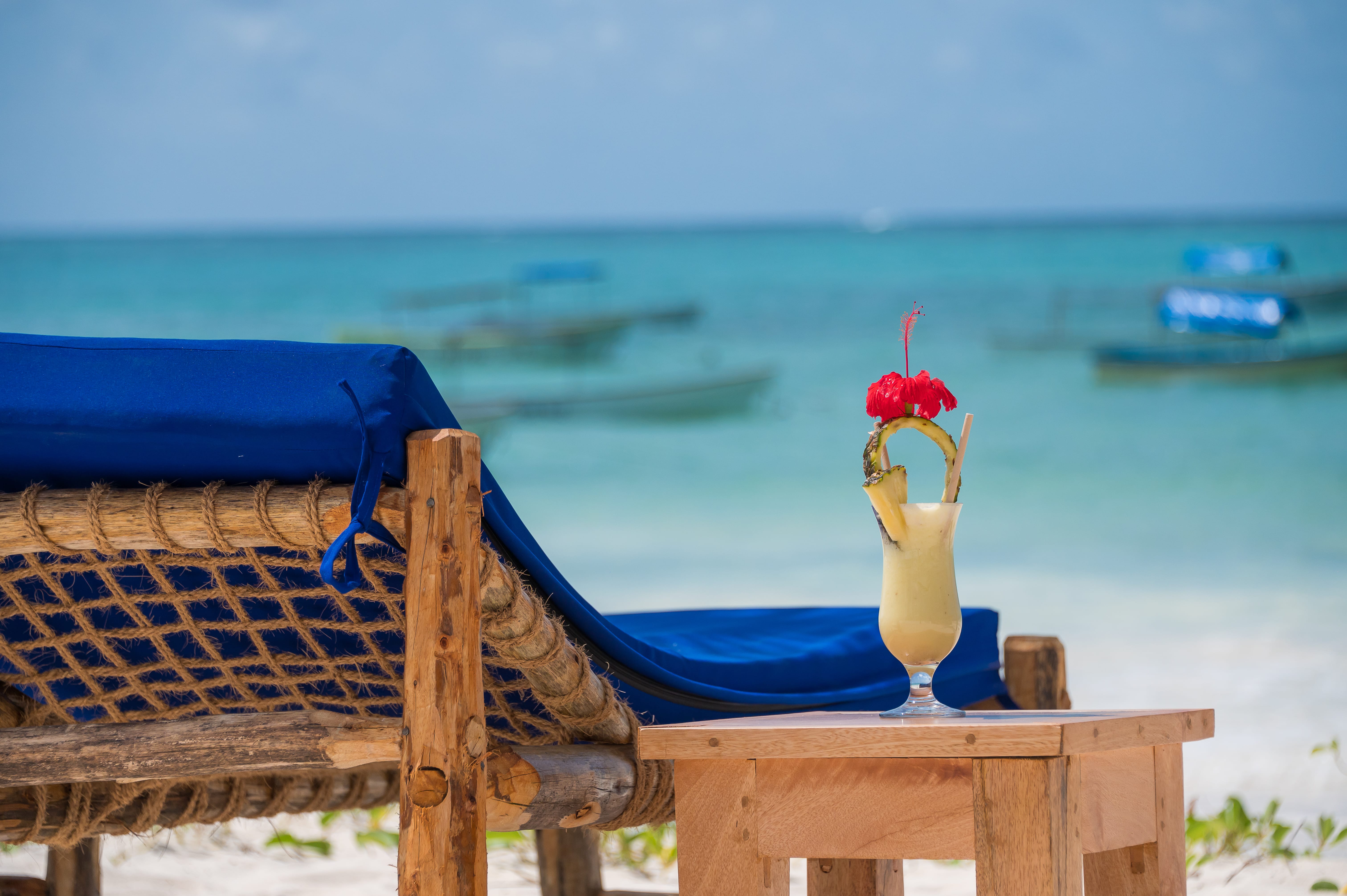 a vase with flowers on a table