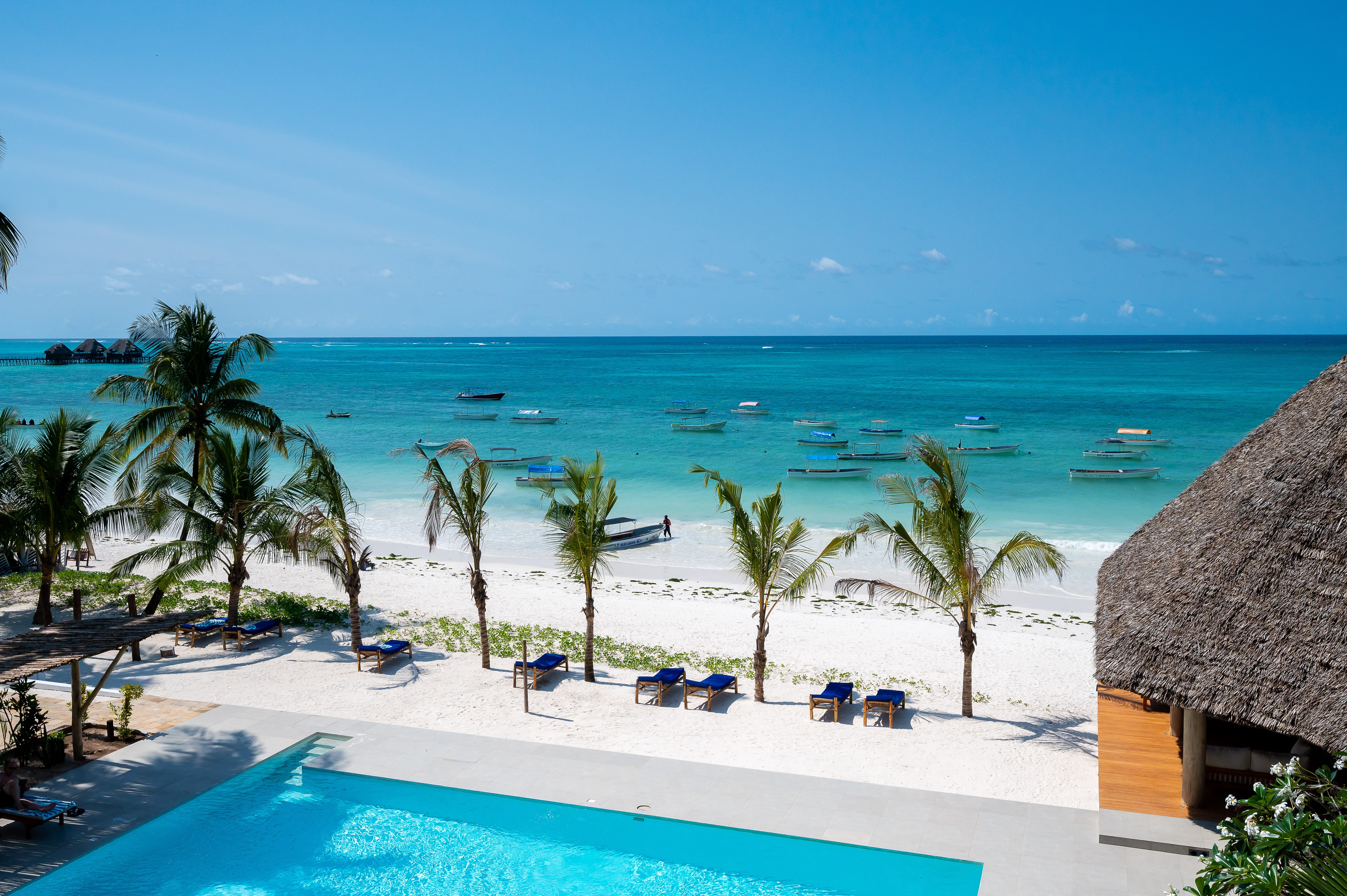 a pool next to a beach