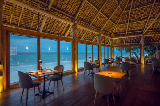 a room with tables and chairs