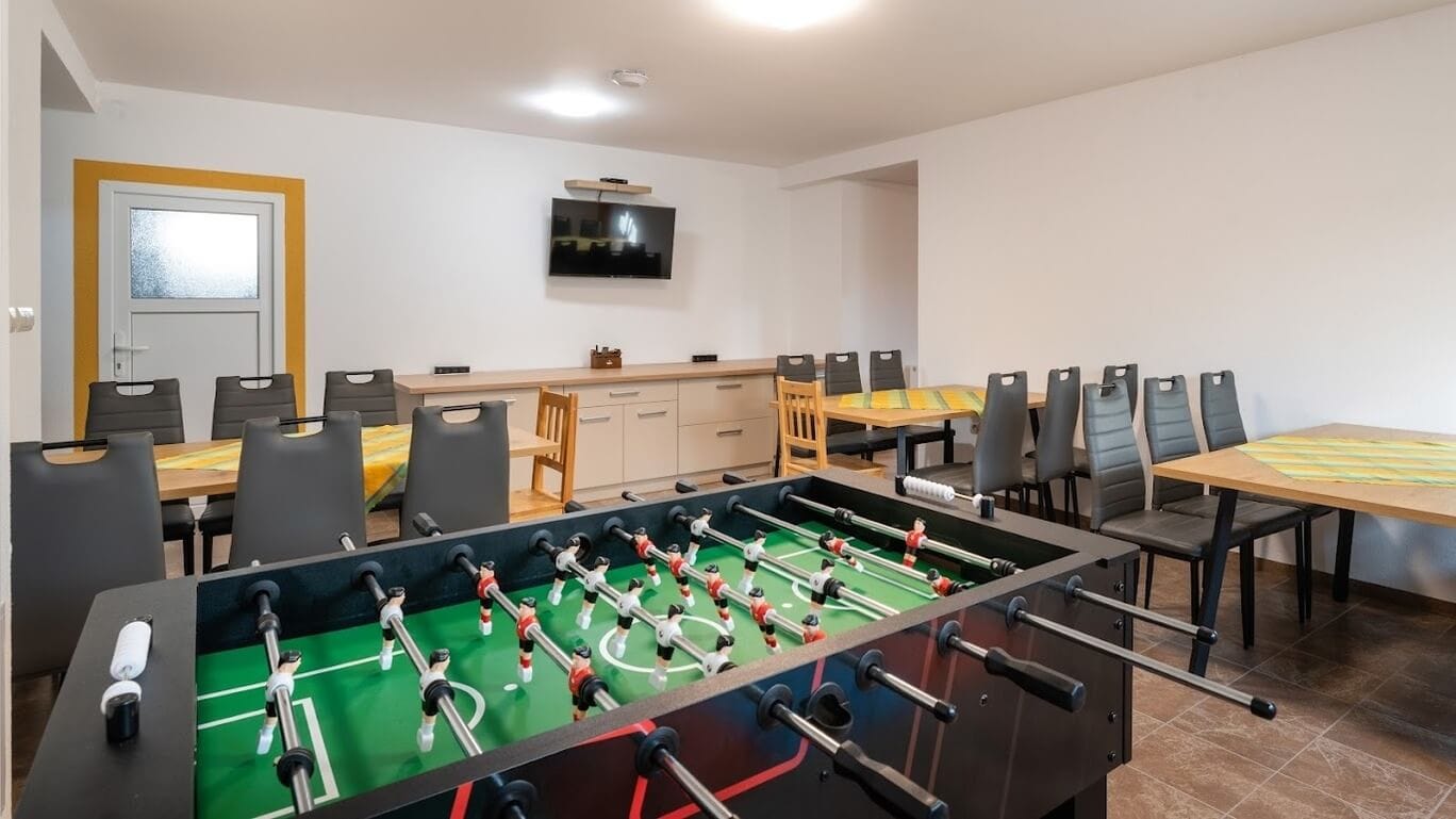 a room with tables and chairs