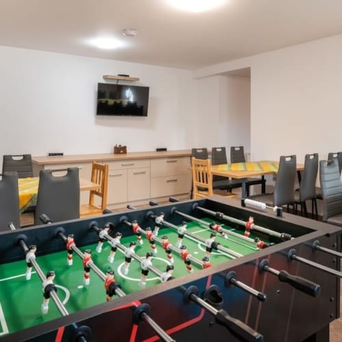 a room with tables and chairs