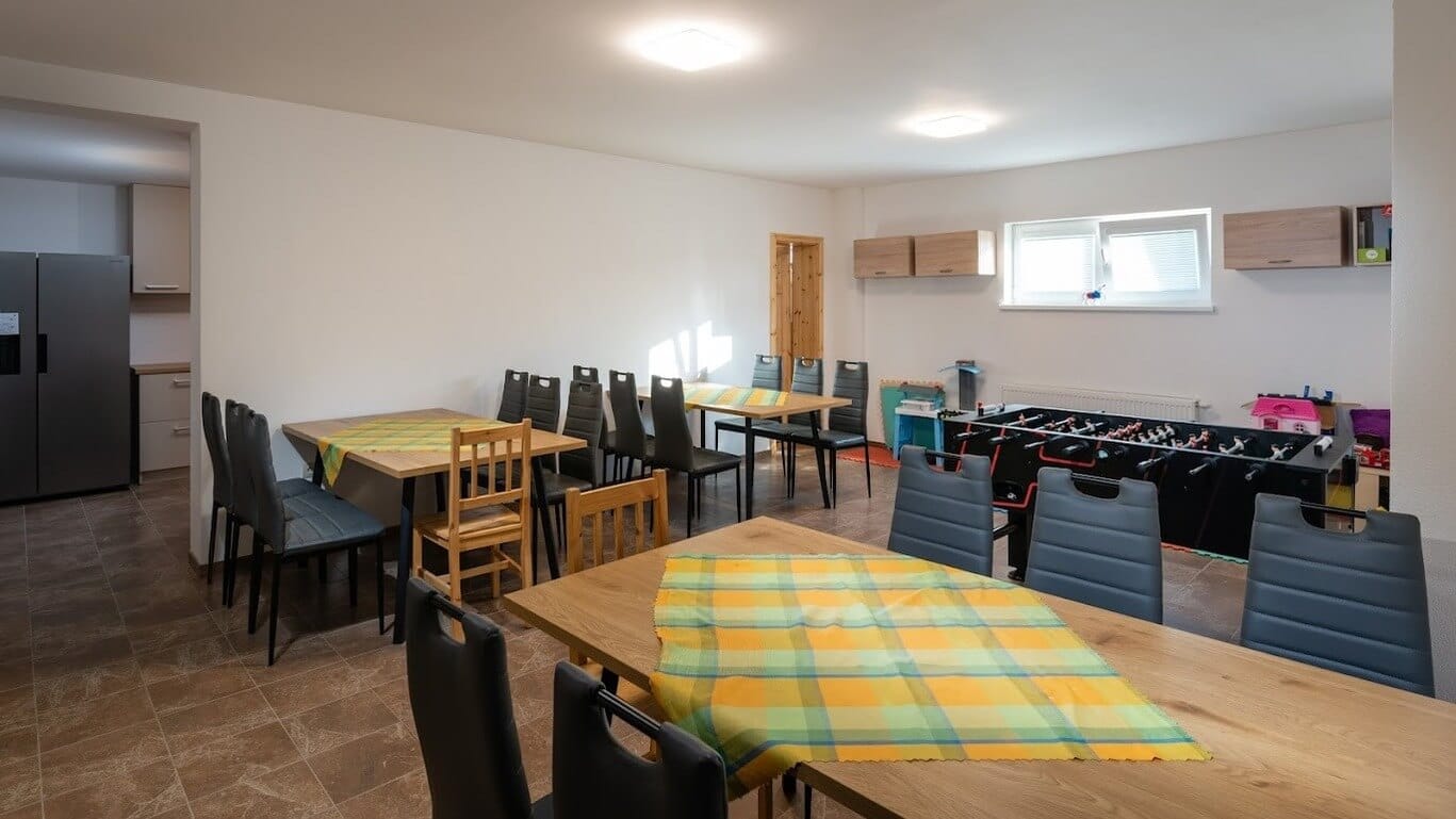 a room with tables and chairs