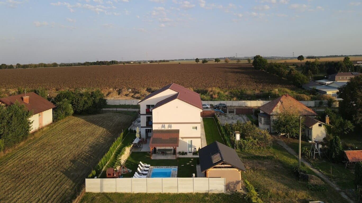 a group of houses in a field
