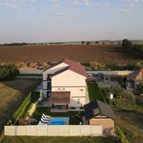 a group of houses in a field