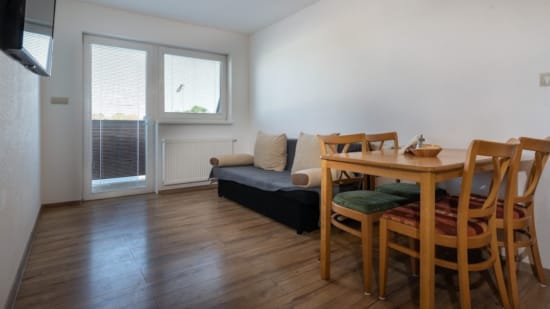 a living room with a couch and table