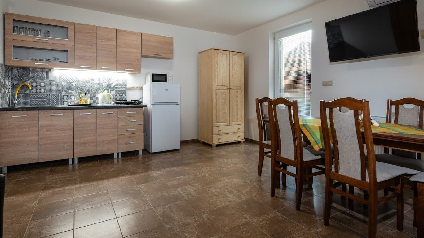a kitchen with a dining table