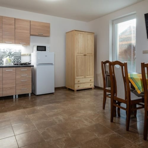 a kitchen with a dining table