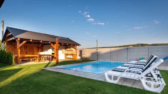 a swimming pool and a house