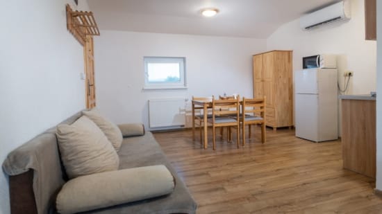a living room with a couch and a table